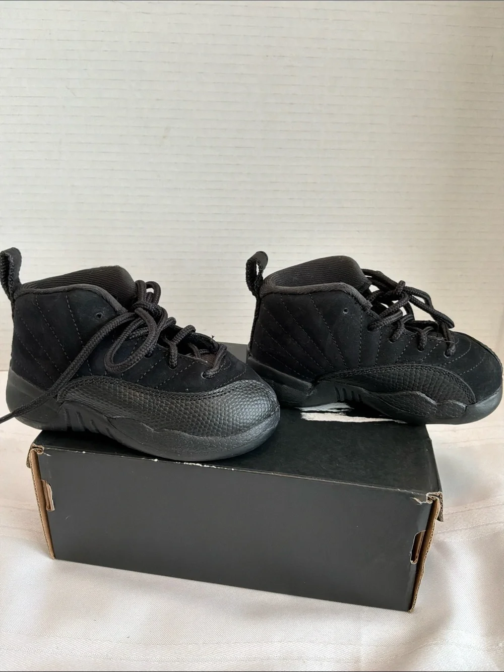 Jordan Kids Black Retro 12 Sneakers size 6c with gold sticker with box